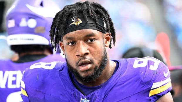 Oct 1, 2023; Charlotte, North Carolina, USA; Minnesota Vikings linebacker D.J. Wonnum (98) on the sidelines in the third quarter at Bank of America Stadium.